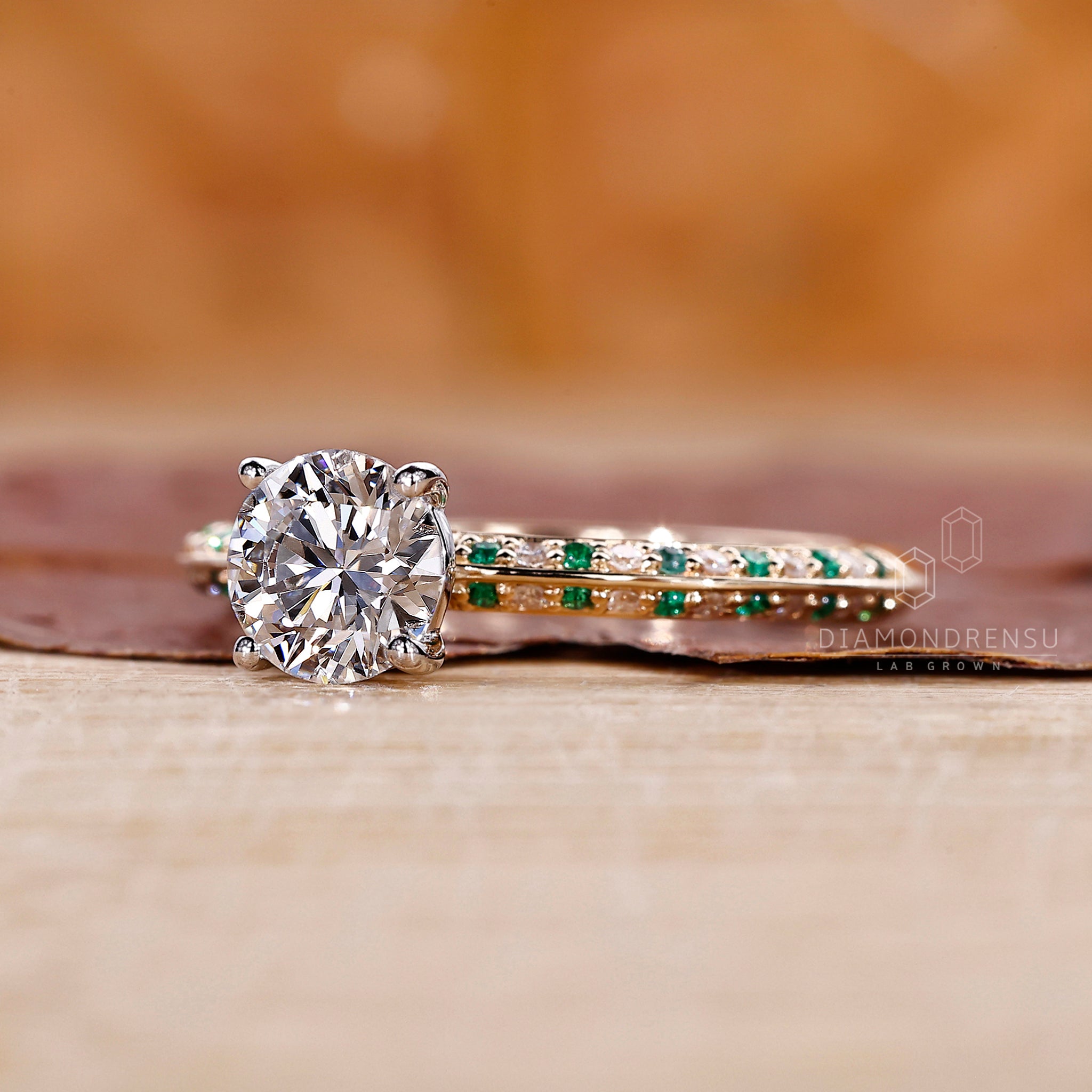Emerald Round cut Diamond added to custom engagement ring.
