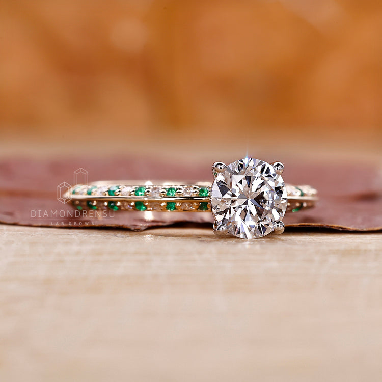 White and yellow gold ring made with lab grown diamond.
