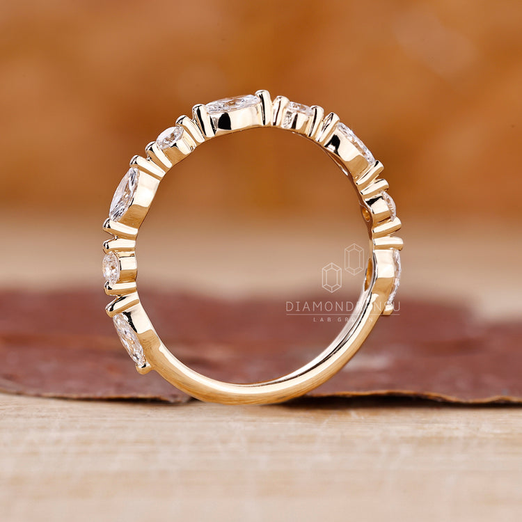 Buy wedding band with mixed diamond cuts for added detail.