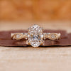 Oval cut diamond ring crafted in yellow gold ring.