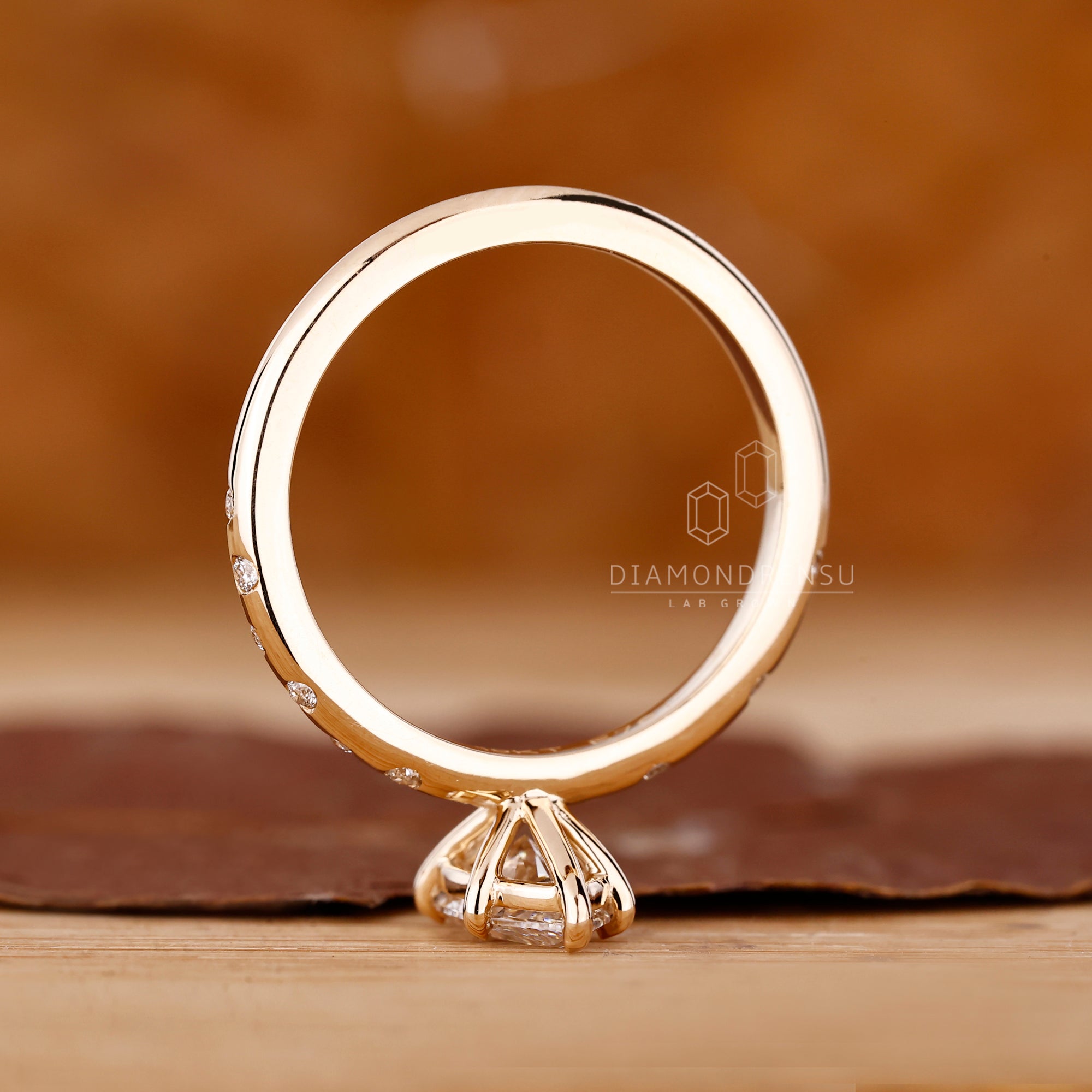 Lab grown diamond engagement ring in marquise shape.
