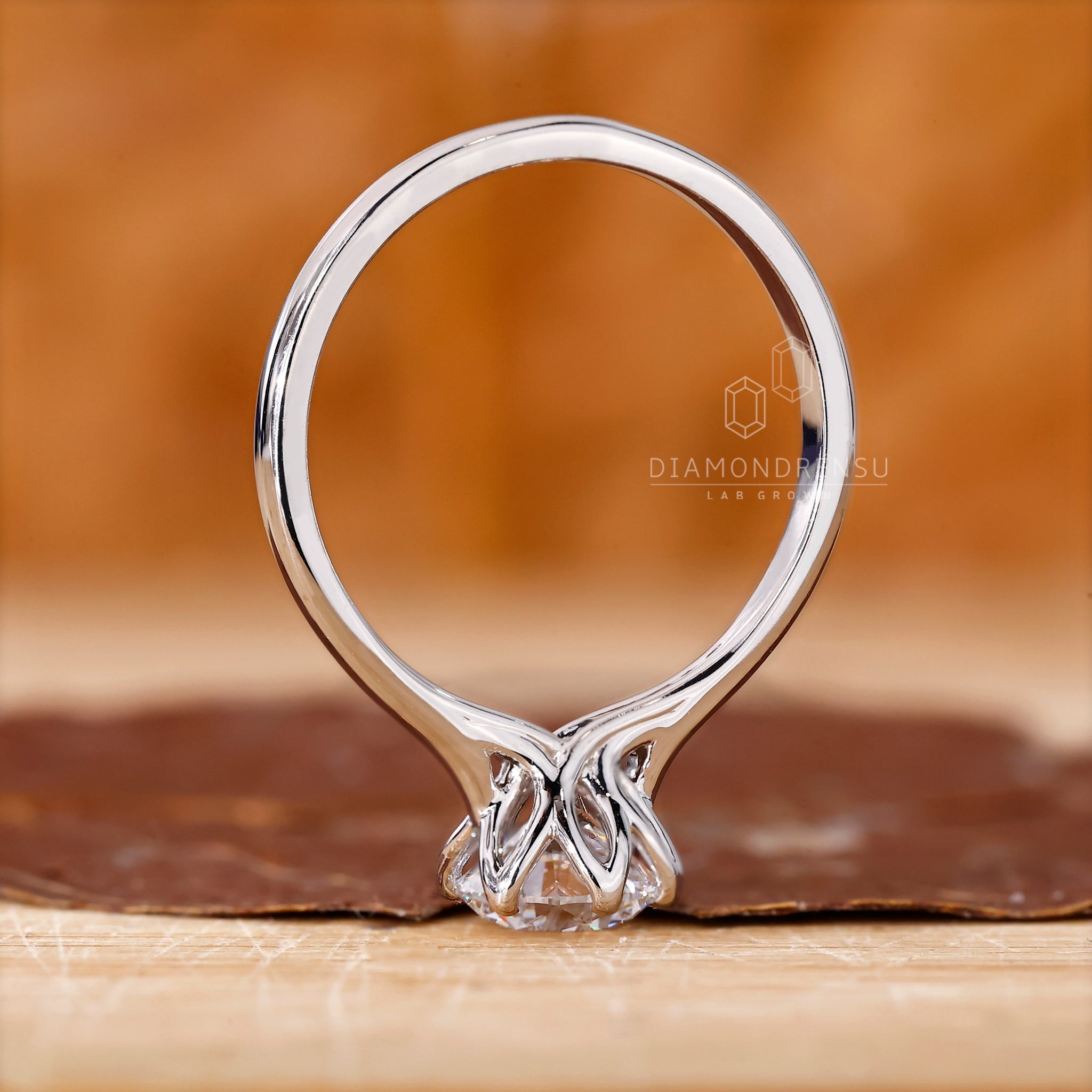 Cathedral setting engagement ring in white gold