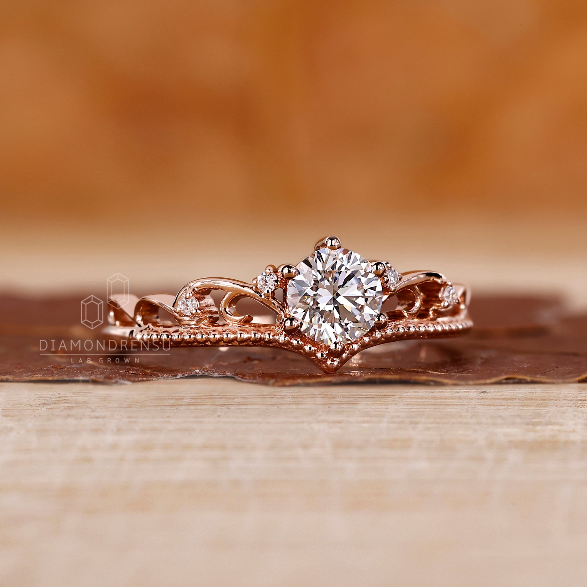 6 prong setting ring holding round diamond.
