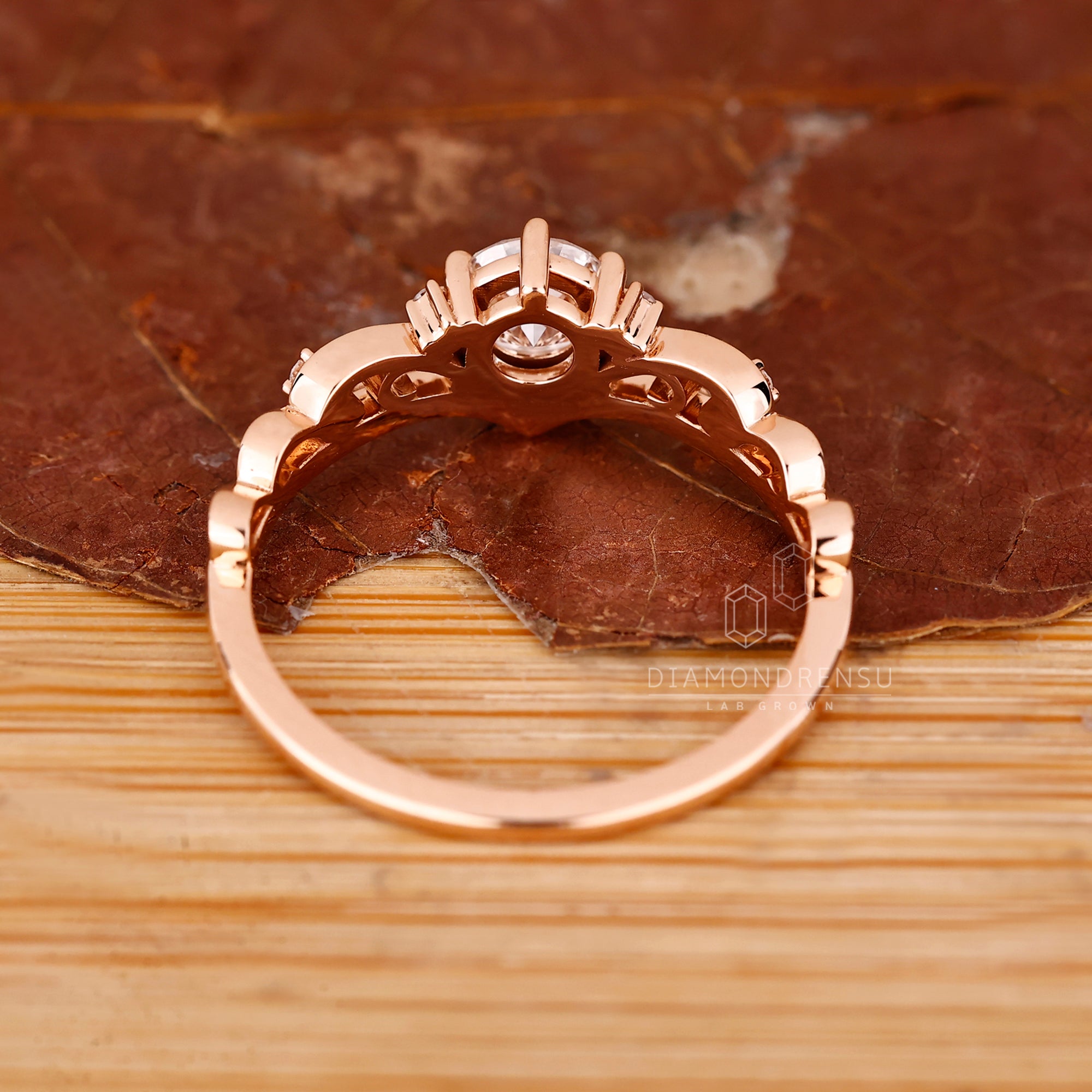 Custom engagement ring in vintage rose gold style.
