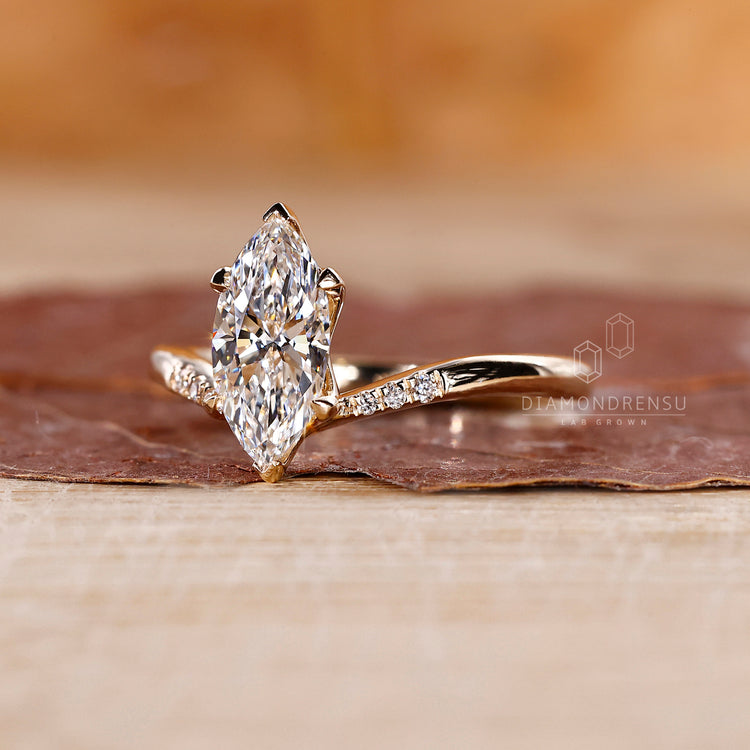 UK engagement ring designed in yellow gold setting.
