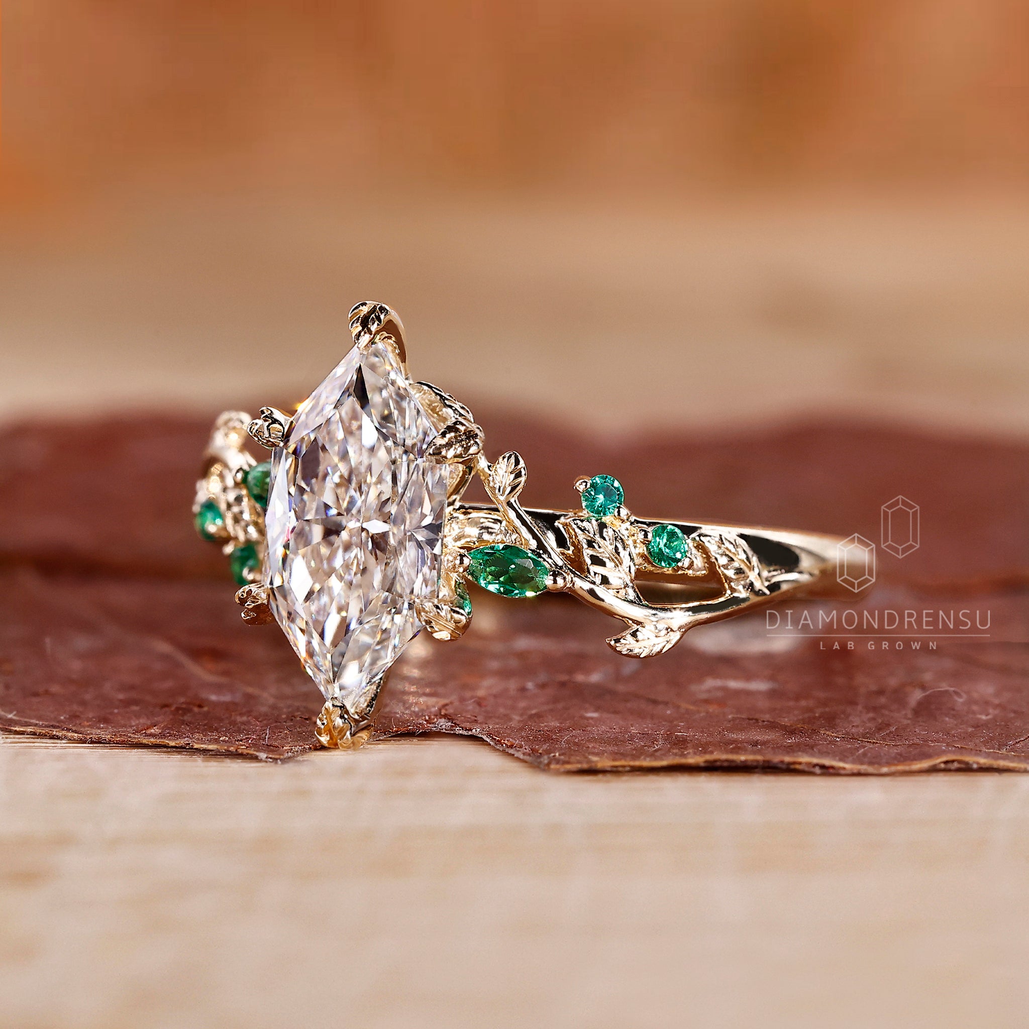 Yellow Gold engagement ring designed with Dutch marquise cut diamond.