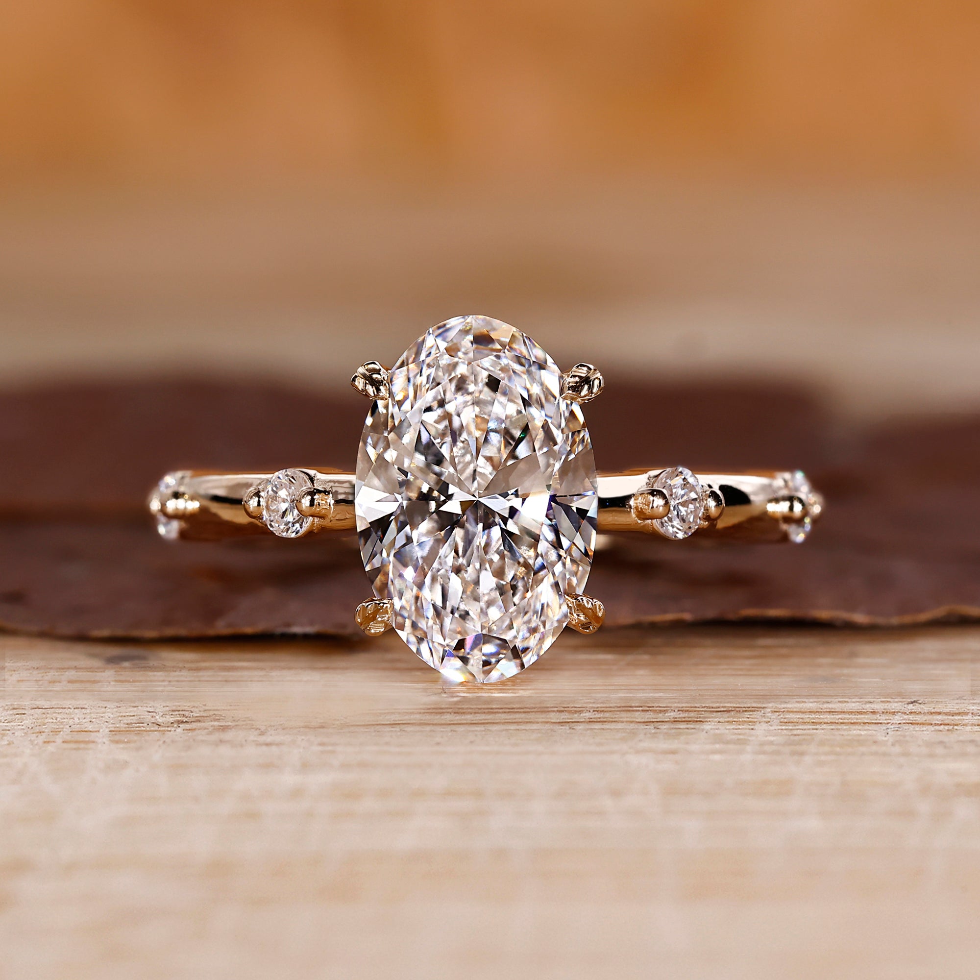 Oval cut diamond ring with hidden halo setting.
