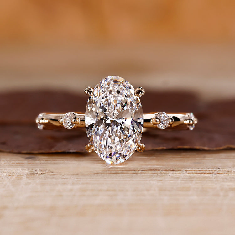 Oval cut diamond ring with hidden halo setting.
