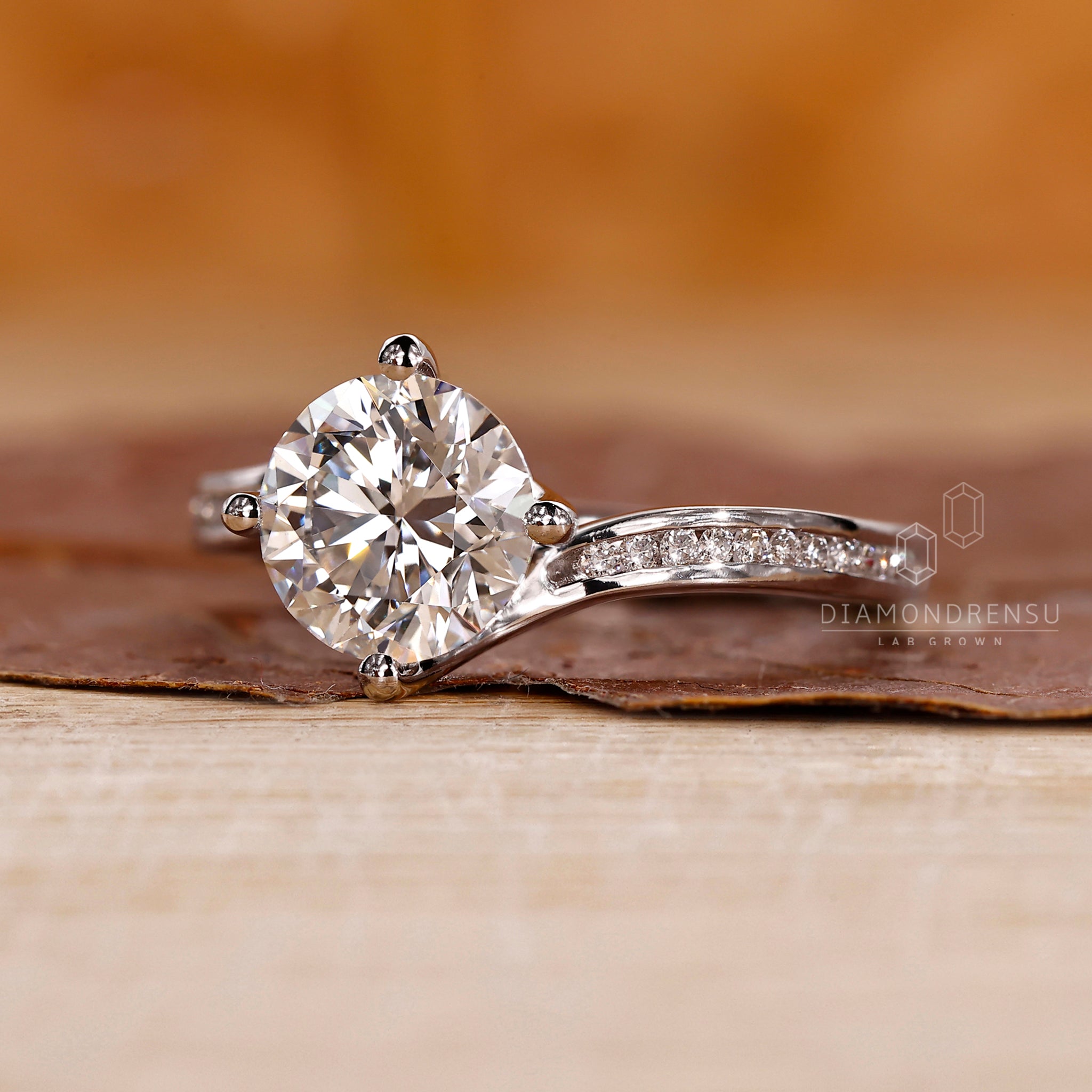 Pave band used with bypass diamond ring design.