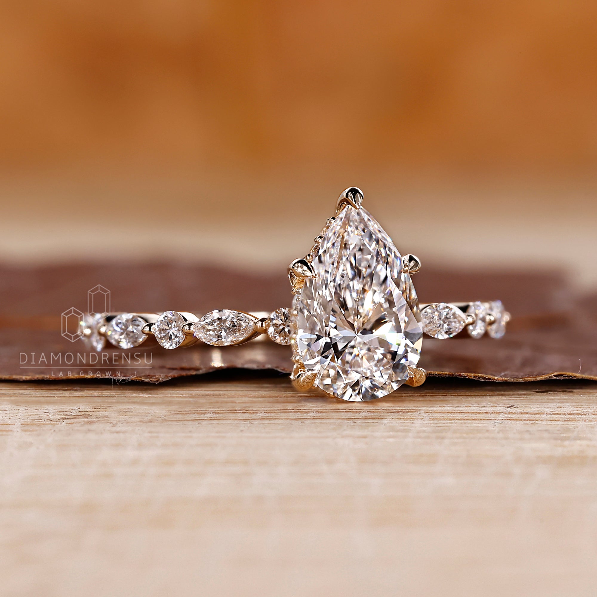 Shared prong ring crafted with round and marquise diamonds.
