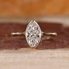 Bezel set engagement ring with a smooth modern edge.
