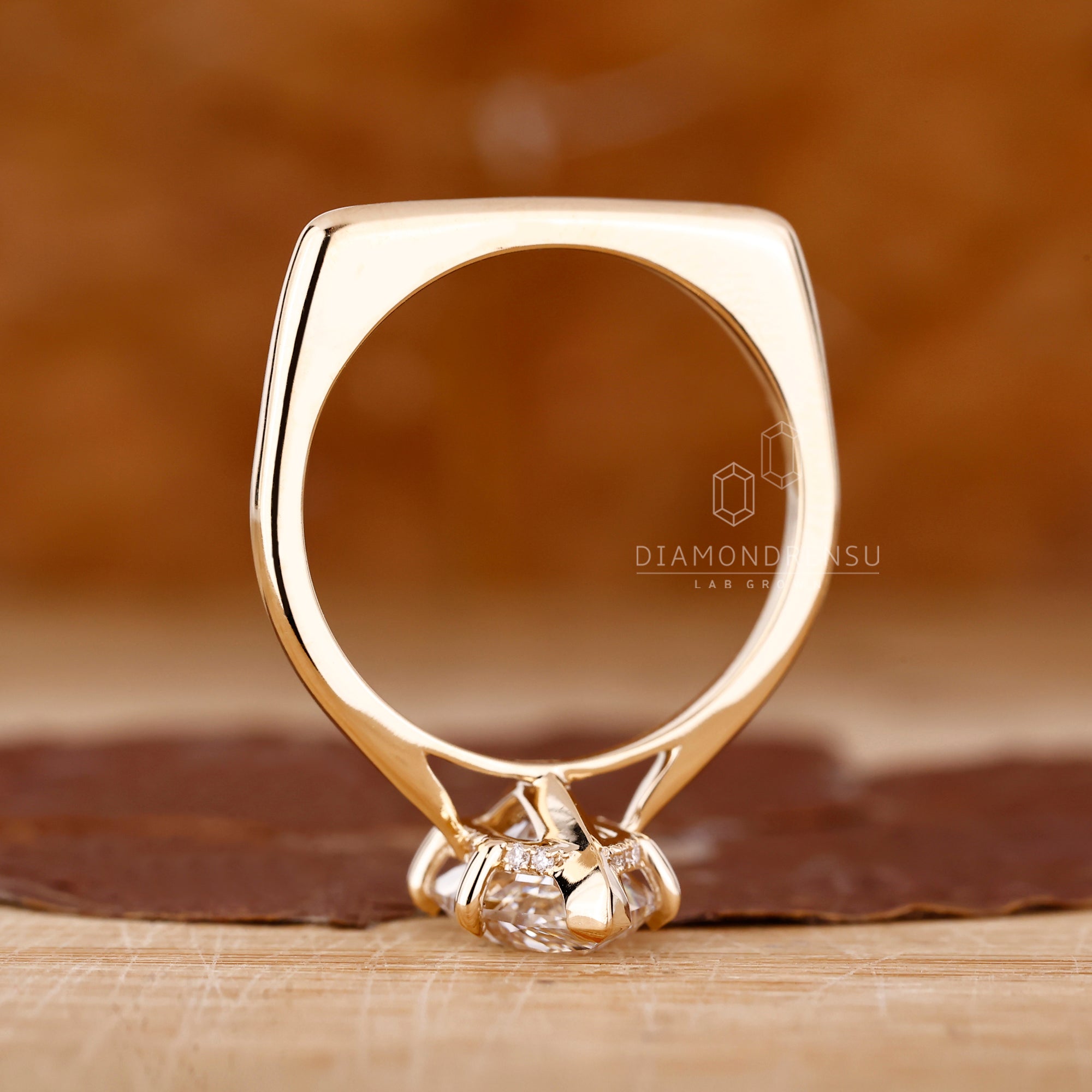 Diamondrensu UK engagement ring with cathedral setting.
