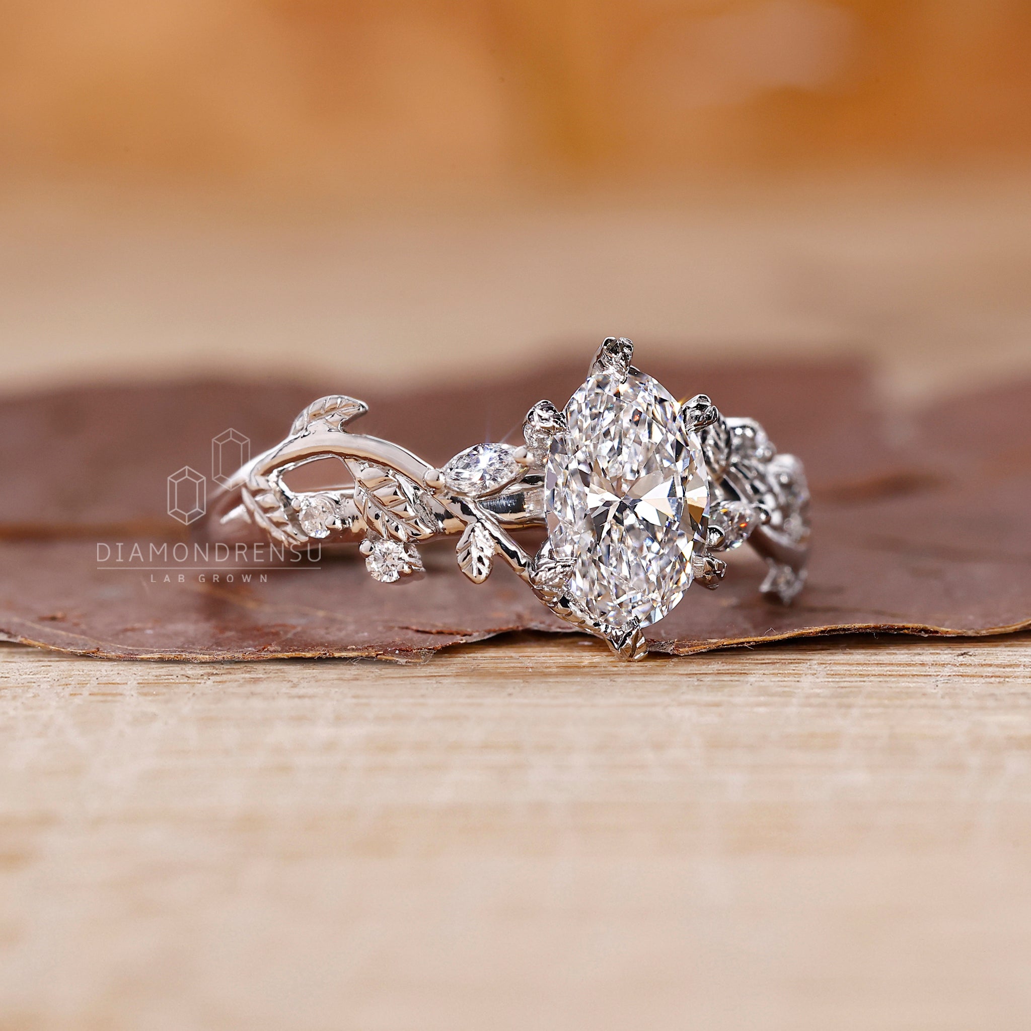 Unique Engagement Ring combines oval, round, and marquise cuts.