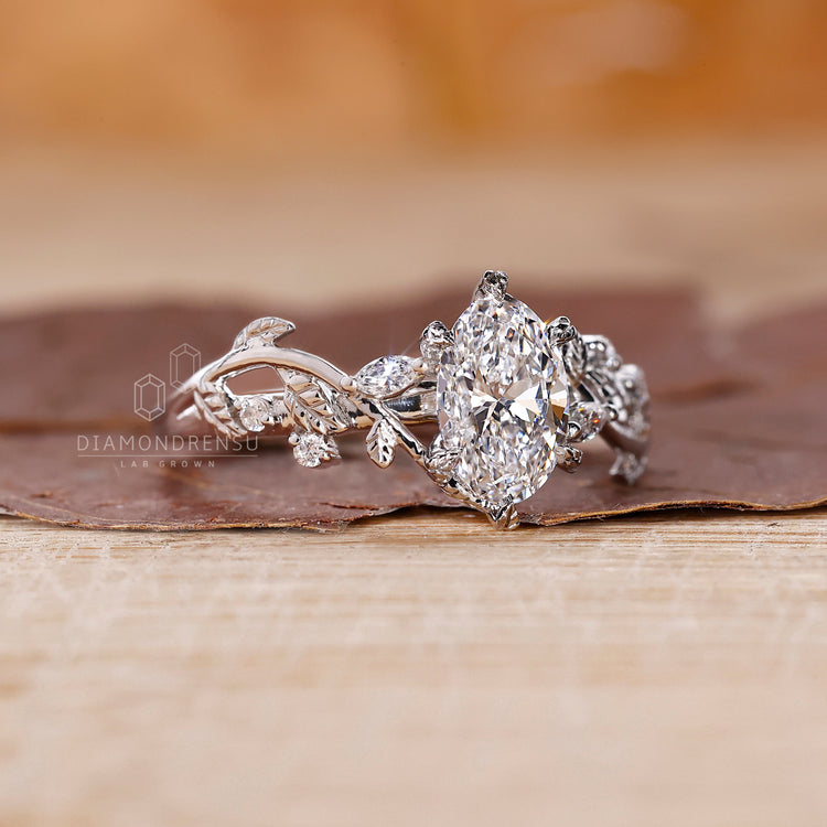 Unique Engagement Ring combines oval, round, and marquise cuts.