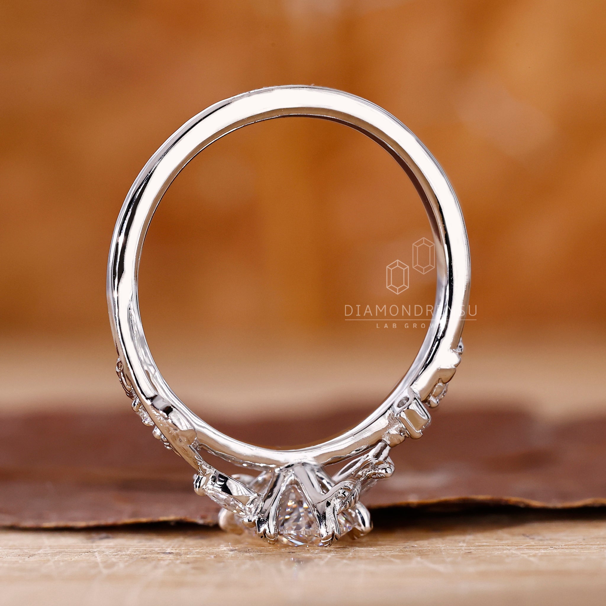Round Engagement Ring crafted with oval and marquise shapes.