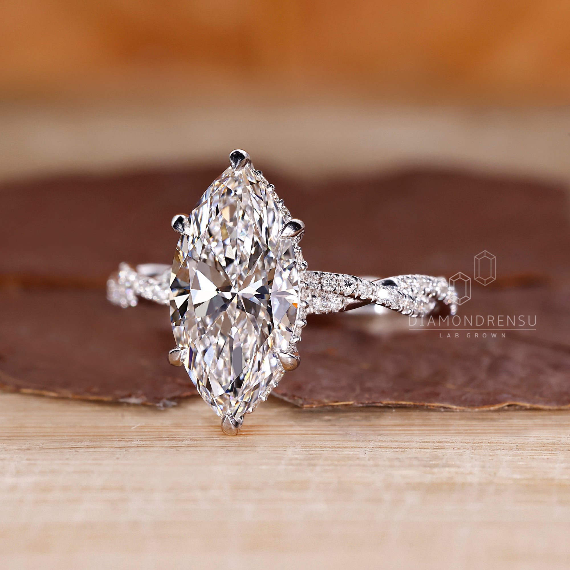 Round cut twisted pave design in a custom setting.
