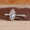 Rose cut engagement ring with a marquise diamond center.

