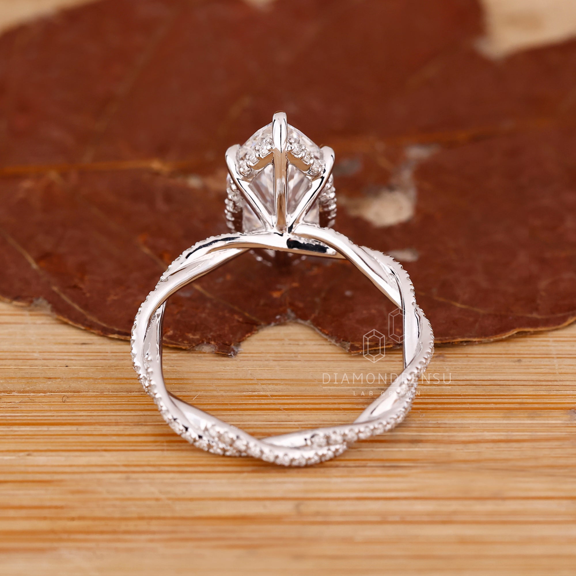 Lab Grown Diamond in a twisted pave engagement ring.
