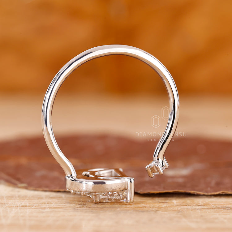 Unique half moon and round diamond engagement ring
