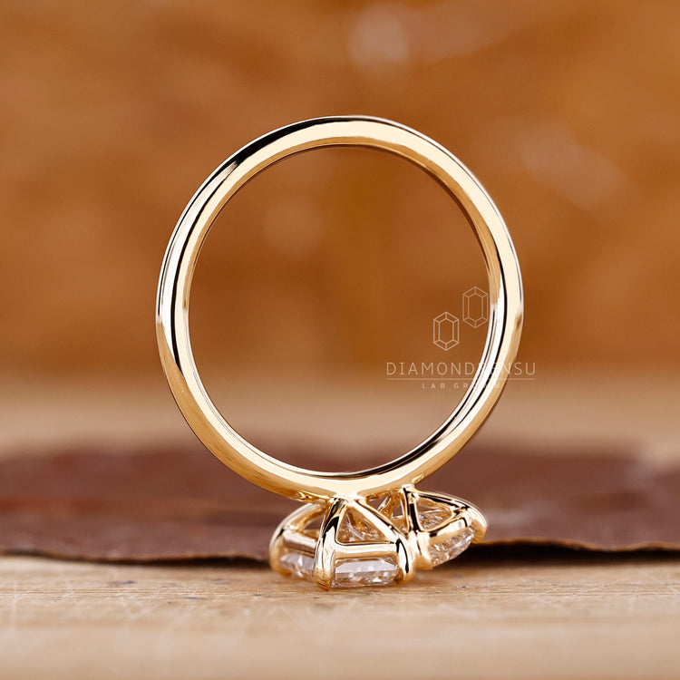 Two Stone engagement ring made with yellow gold ring finish.