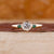 Bezel Three Stone Engagement Ring crafted in yellow gold engagement ring.