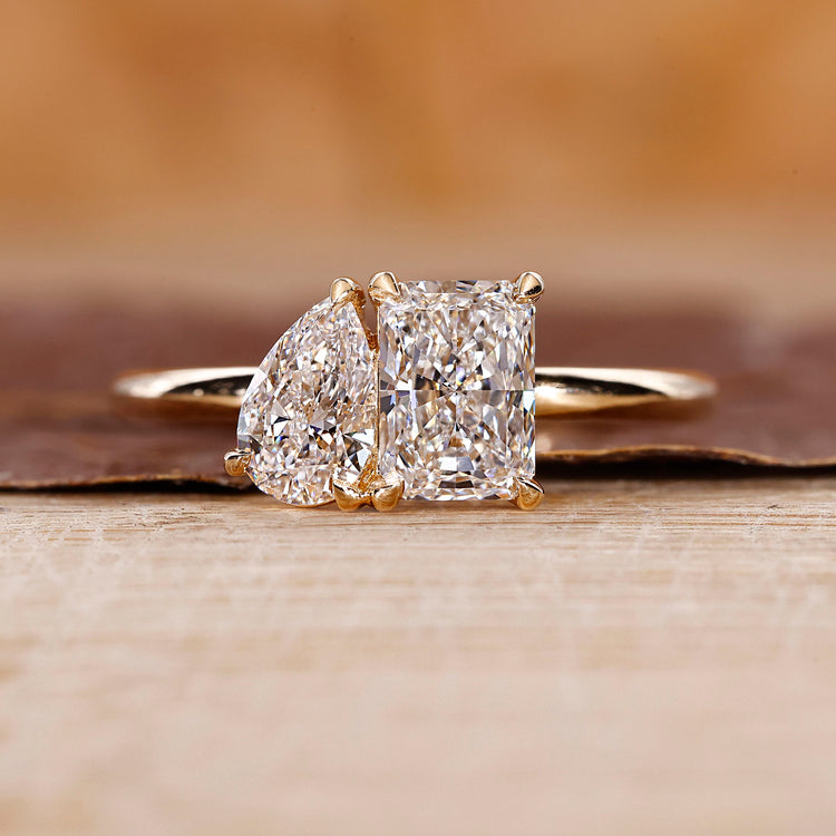 Toi Et Moi Ring crafted with radiant cut and pear cut diamond.