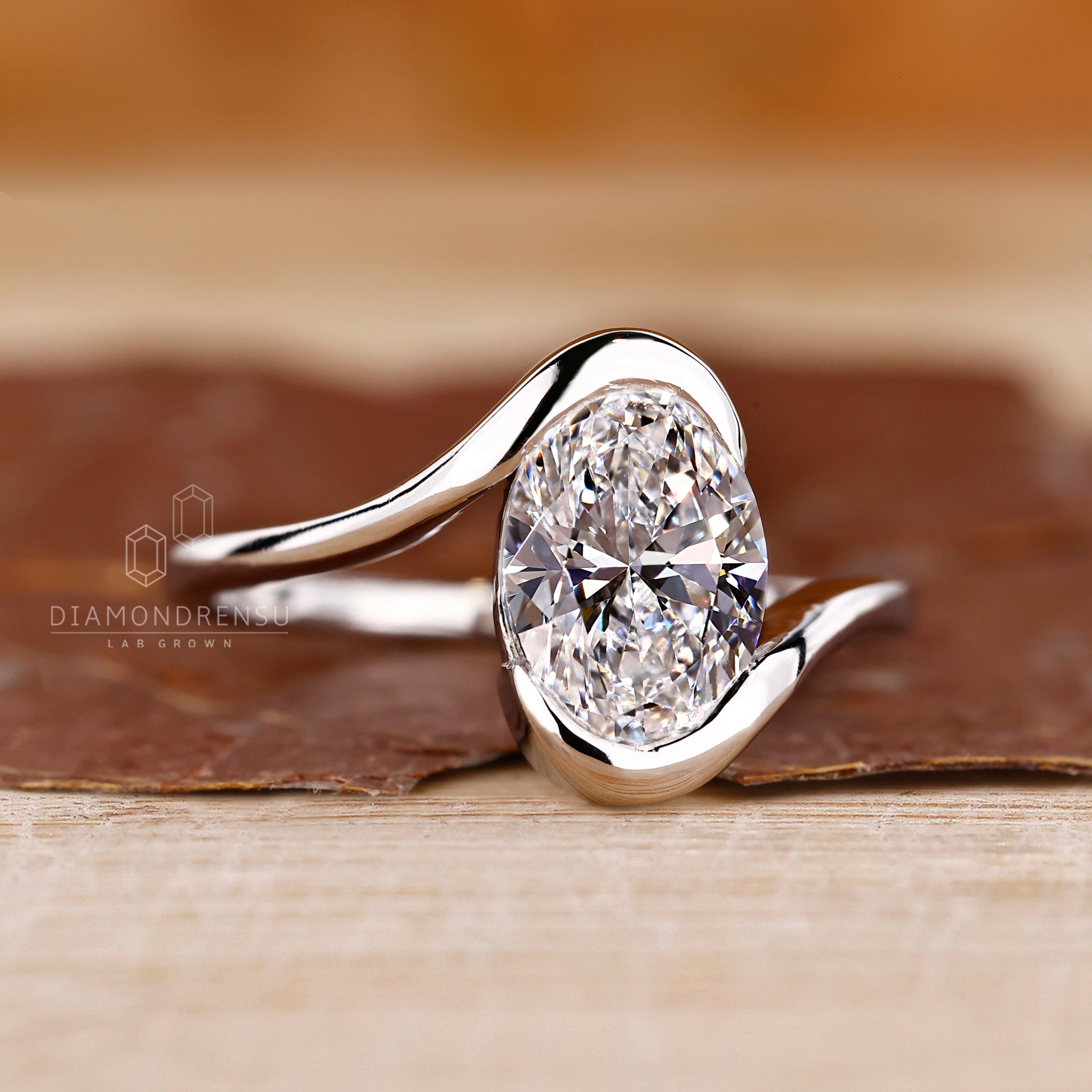 Bypass setting ring with oval and round diamonds.
