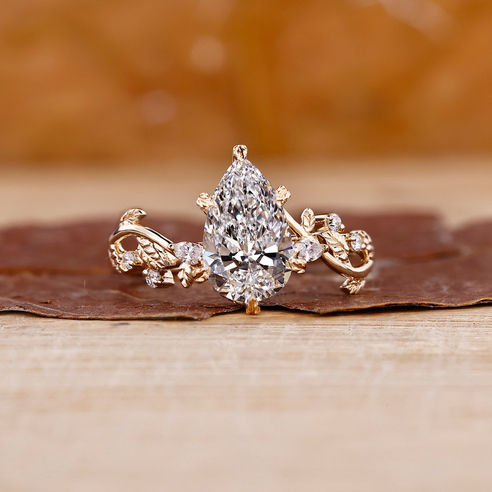 Nature Inspired Engagement Ring made in yellow gold setting.