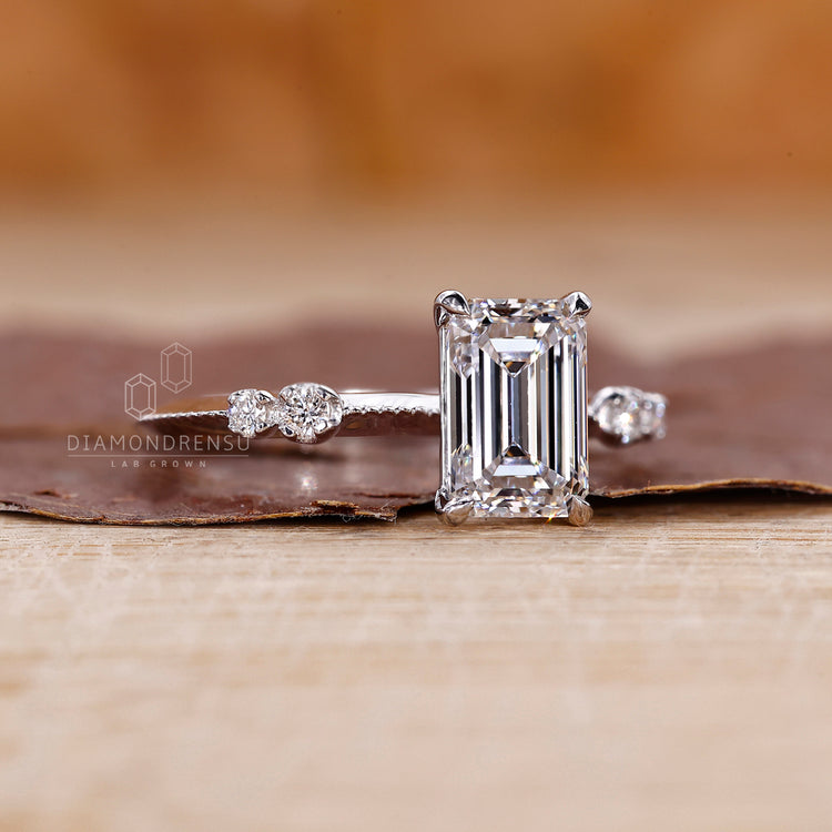 Lab Grown Diamond used for centre emerald cut.