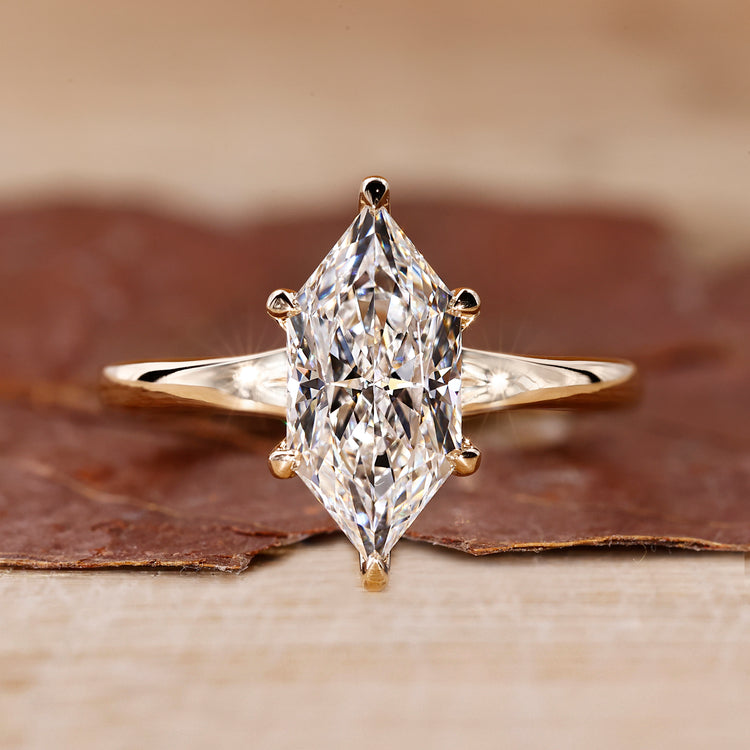 Dutch Marquise Diamond Ring with 6 claw prong setting.
