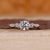 5 diamond ring with a mix of round and marquise cuts.
