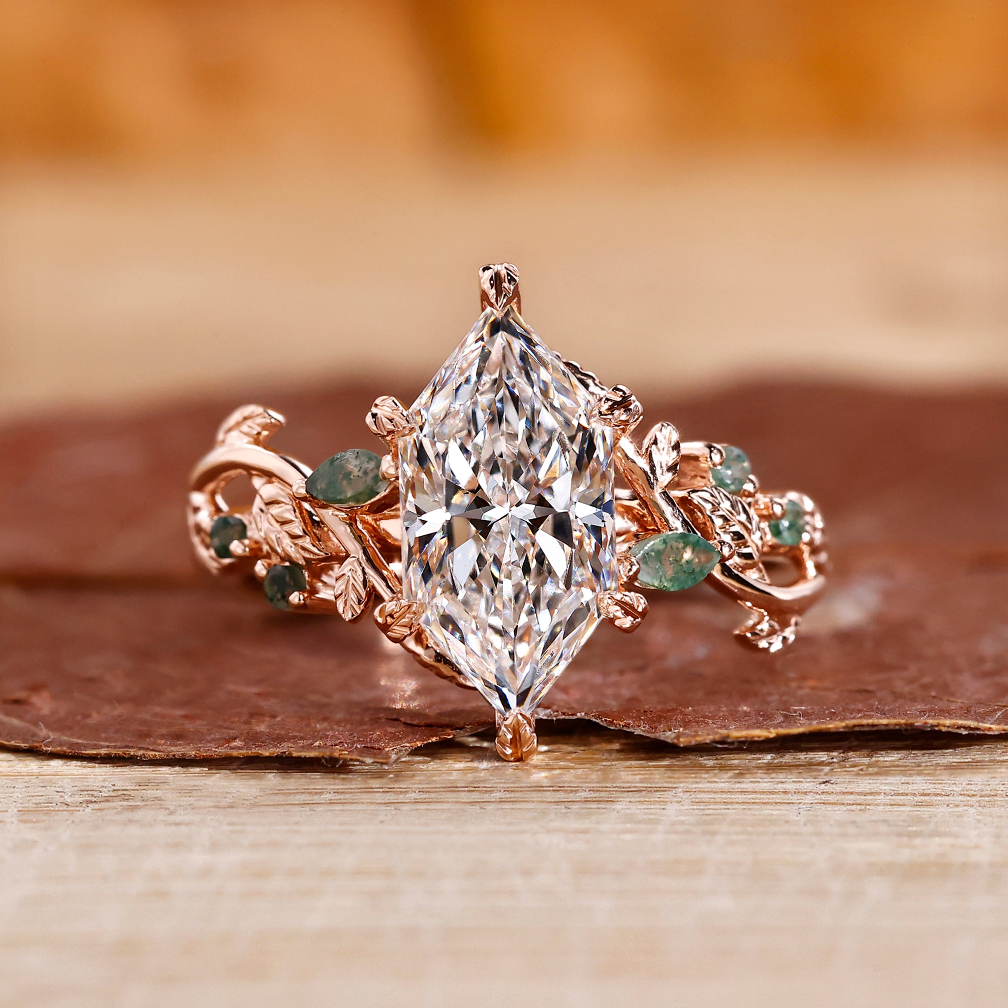 Nature inspired engagement ring with leaf-style pave