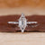 Hexagon ring designed with elongated hexagon step cut diamond.