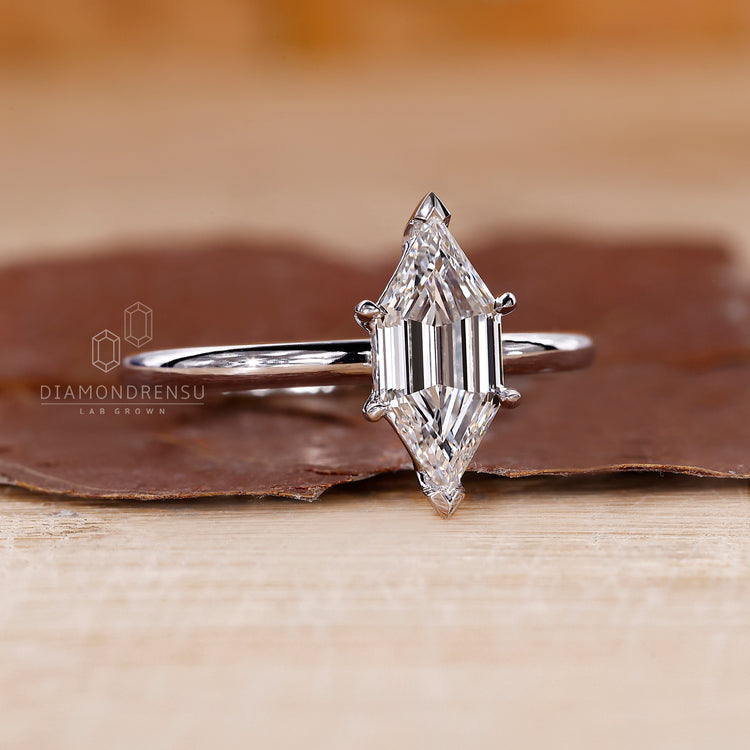Lab grown diamond engagement ring designed with V and claw prong.