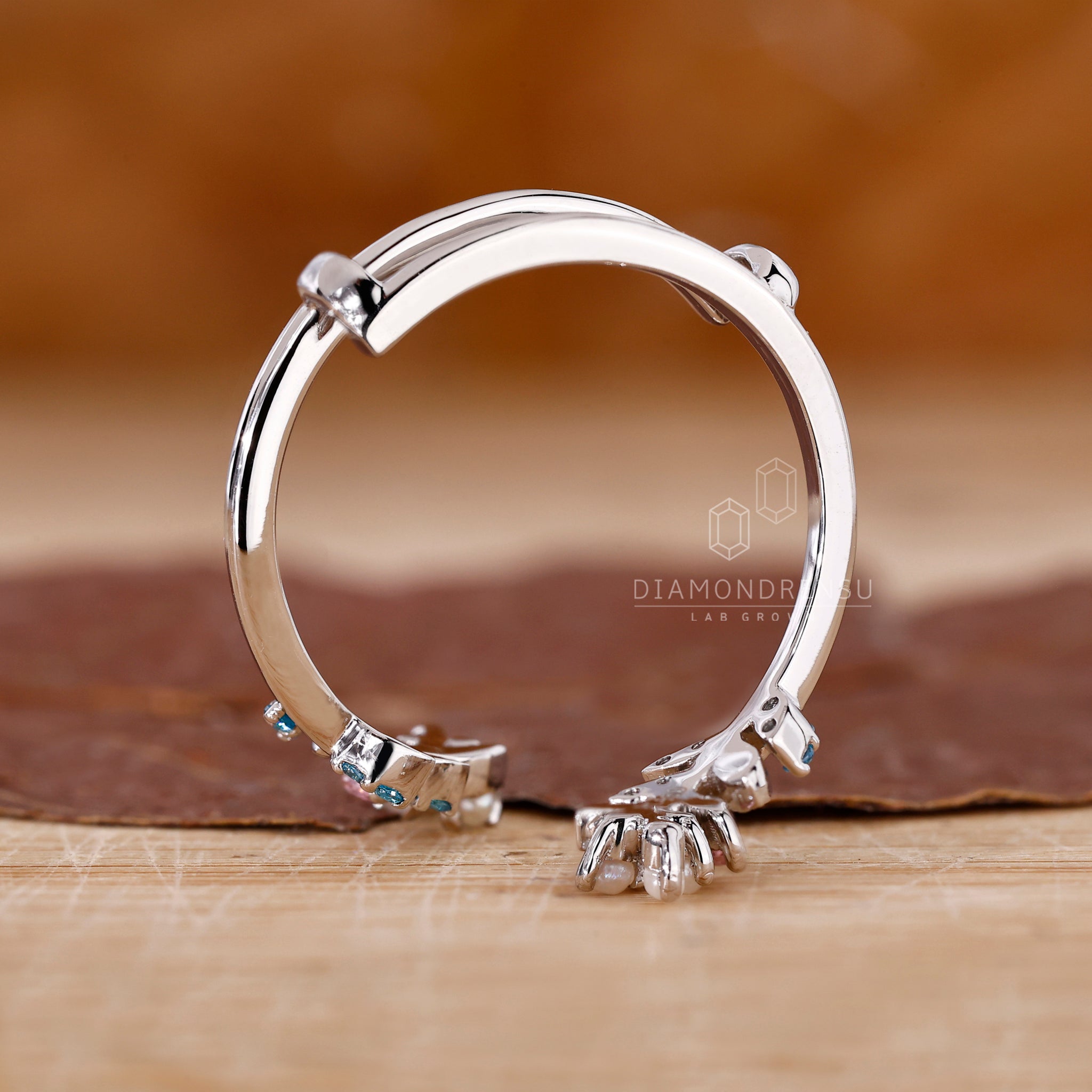 Pink sapphire set in a white gold band with a graceful handmade touch.
