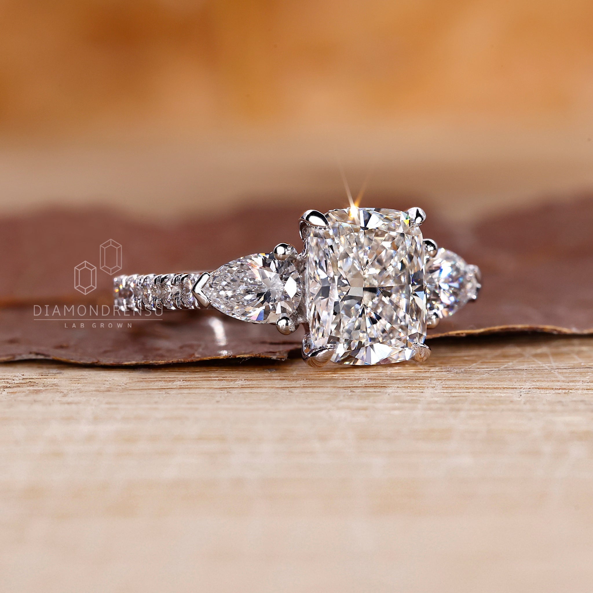 Lab Grown Diamond used in center and side placement.