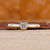 Bezel Set Diamond Ring with round cut diamond center.
