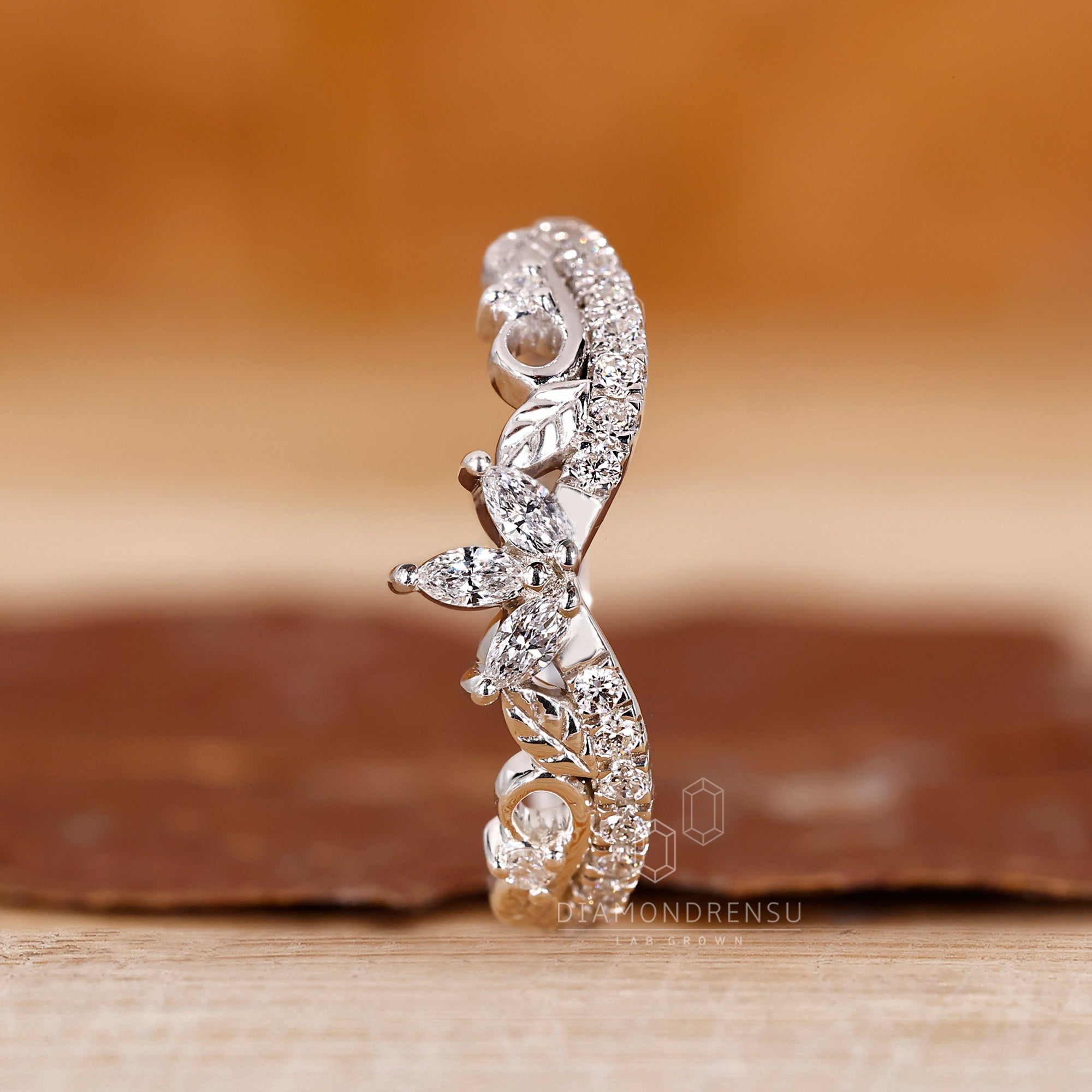 Chevron wedding band crafted with mixed diamond cuts.
