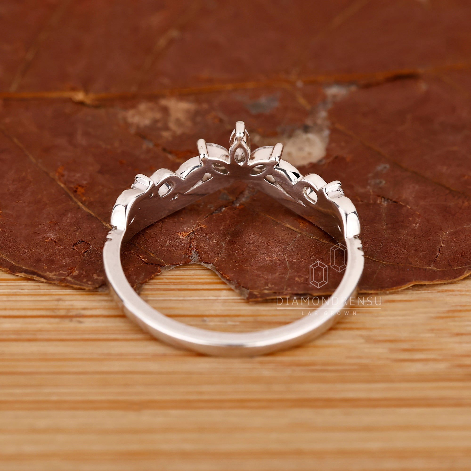 Diamond wedding band with an art deco touch.
