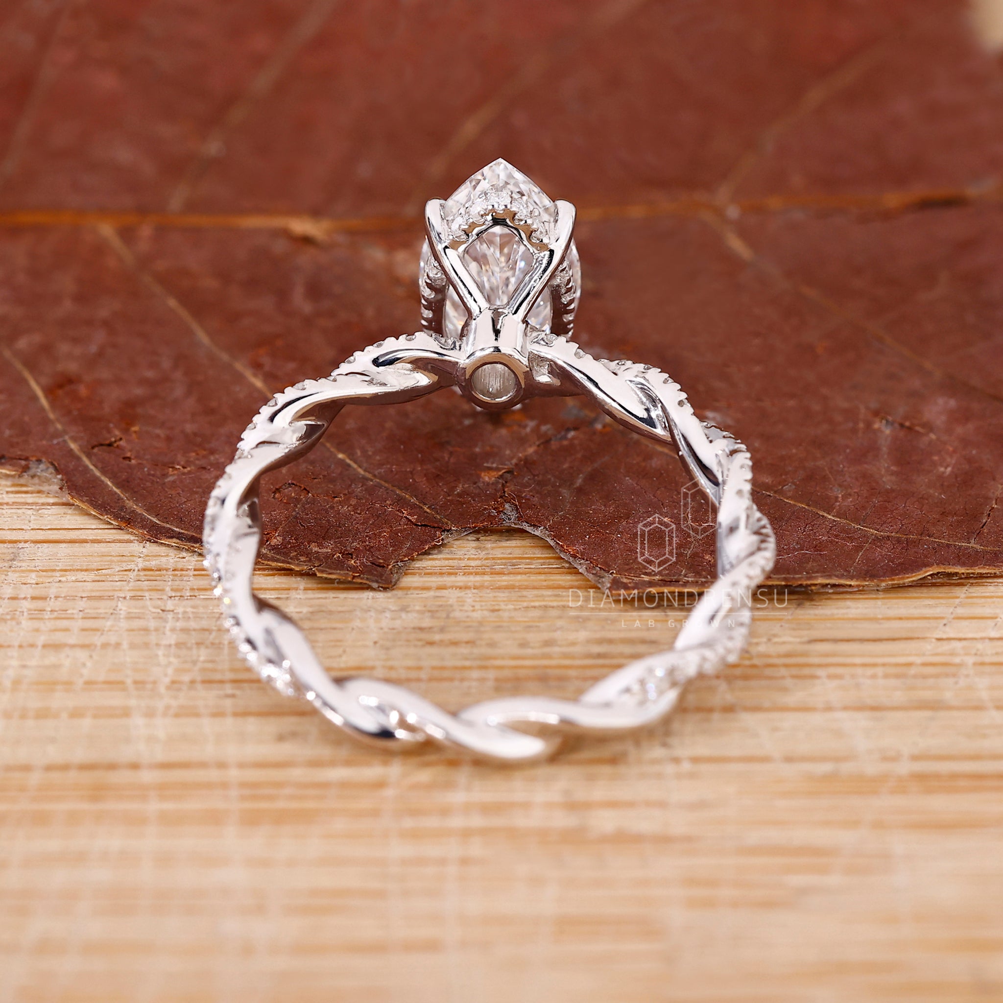 Lab grown diamond ring with marquise diamond design.
