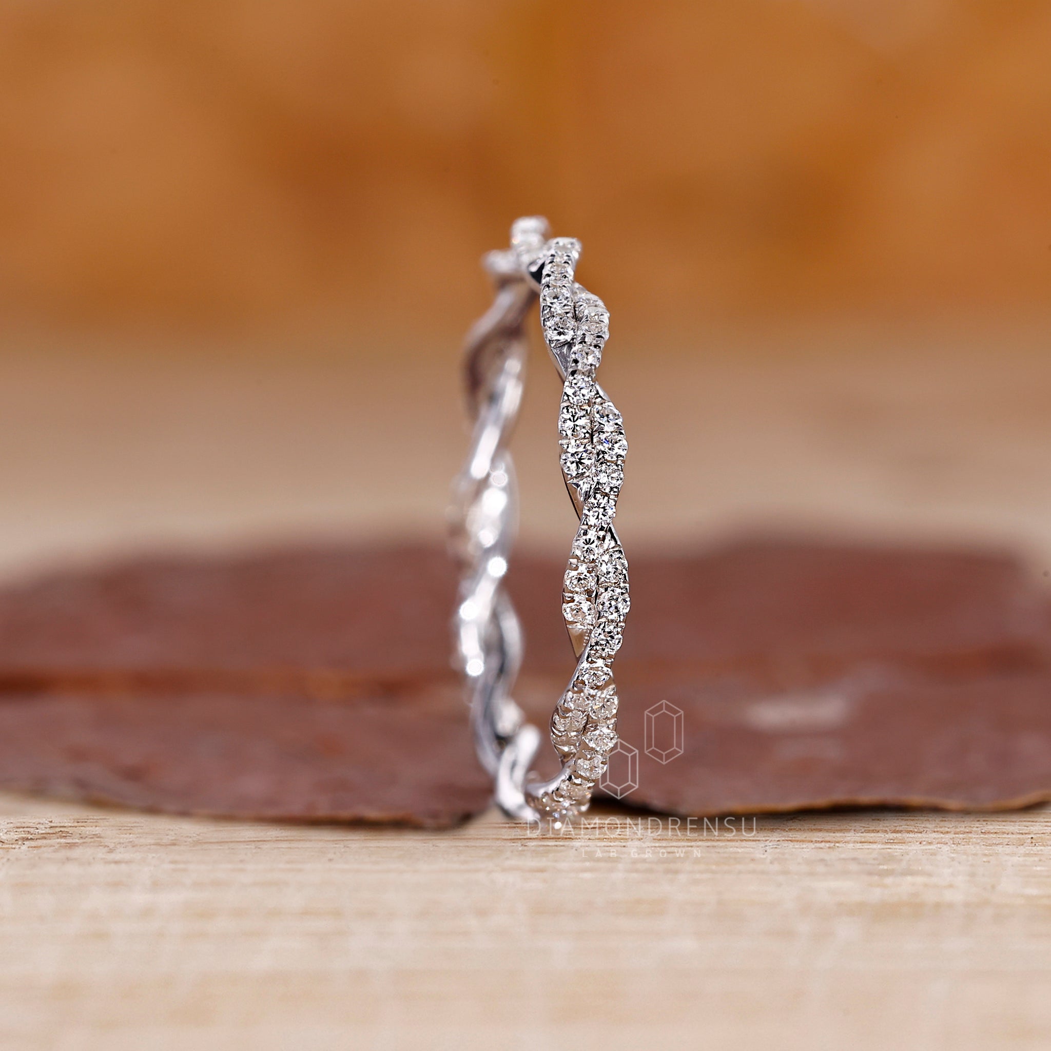 Custom diamond band designed with round stones and handmade finish.