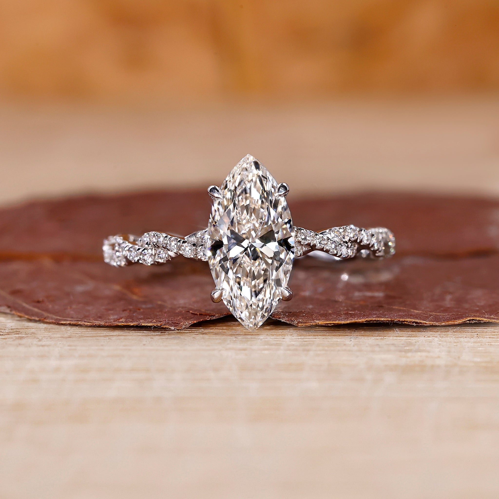 Marquise diamond engagement ring with 4 claw prong setting.
