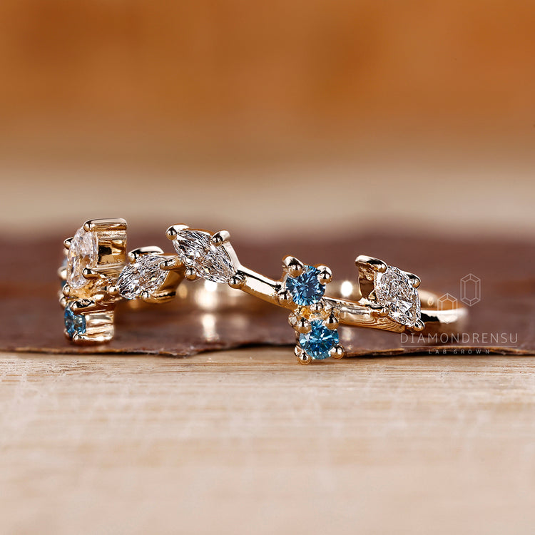 Blue diamond band featuring mixed shapes.
