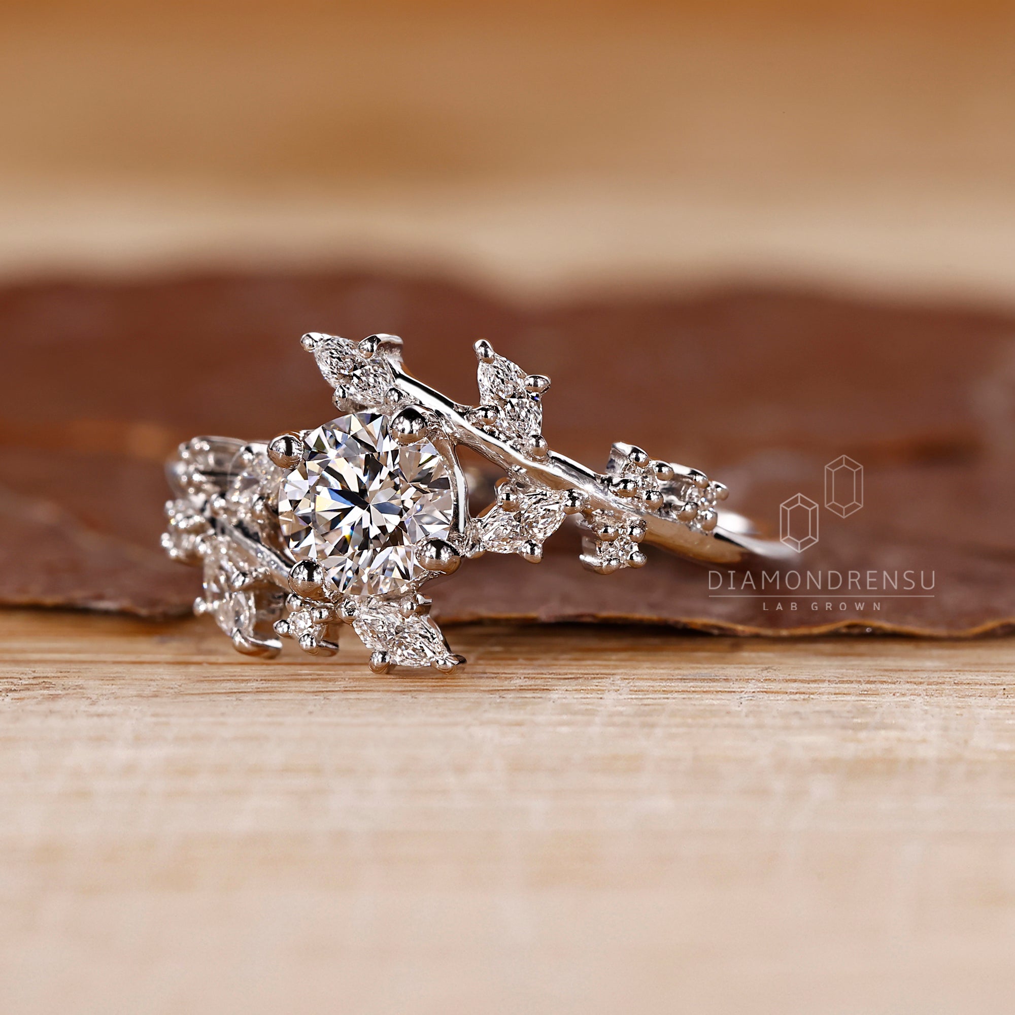 Four prong ring with round center diamond.
