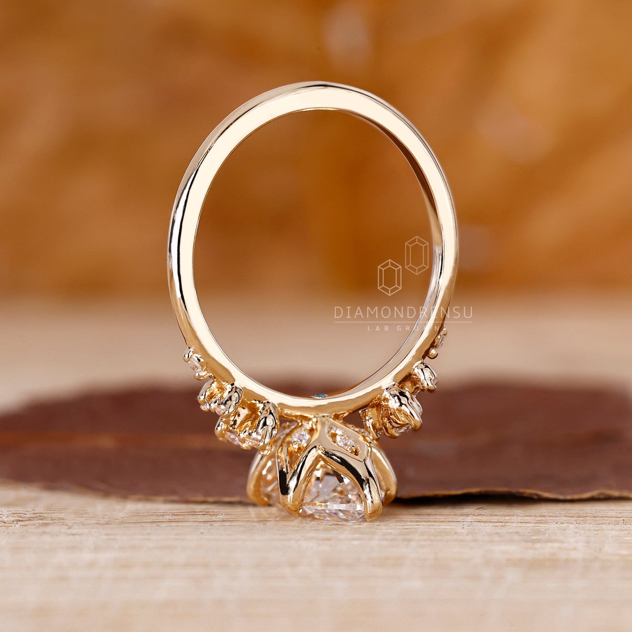 Yellow Gold Engagement Ring made with tulip ring style.
