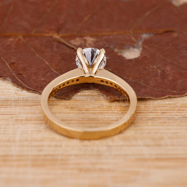 Lab Grown Diamond in round diamond channel set ring.
