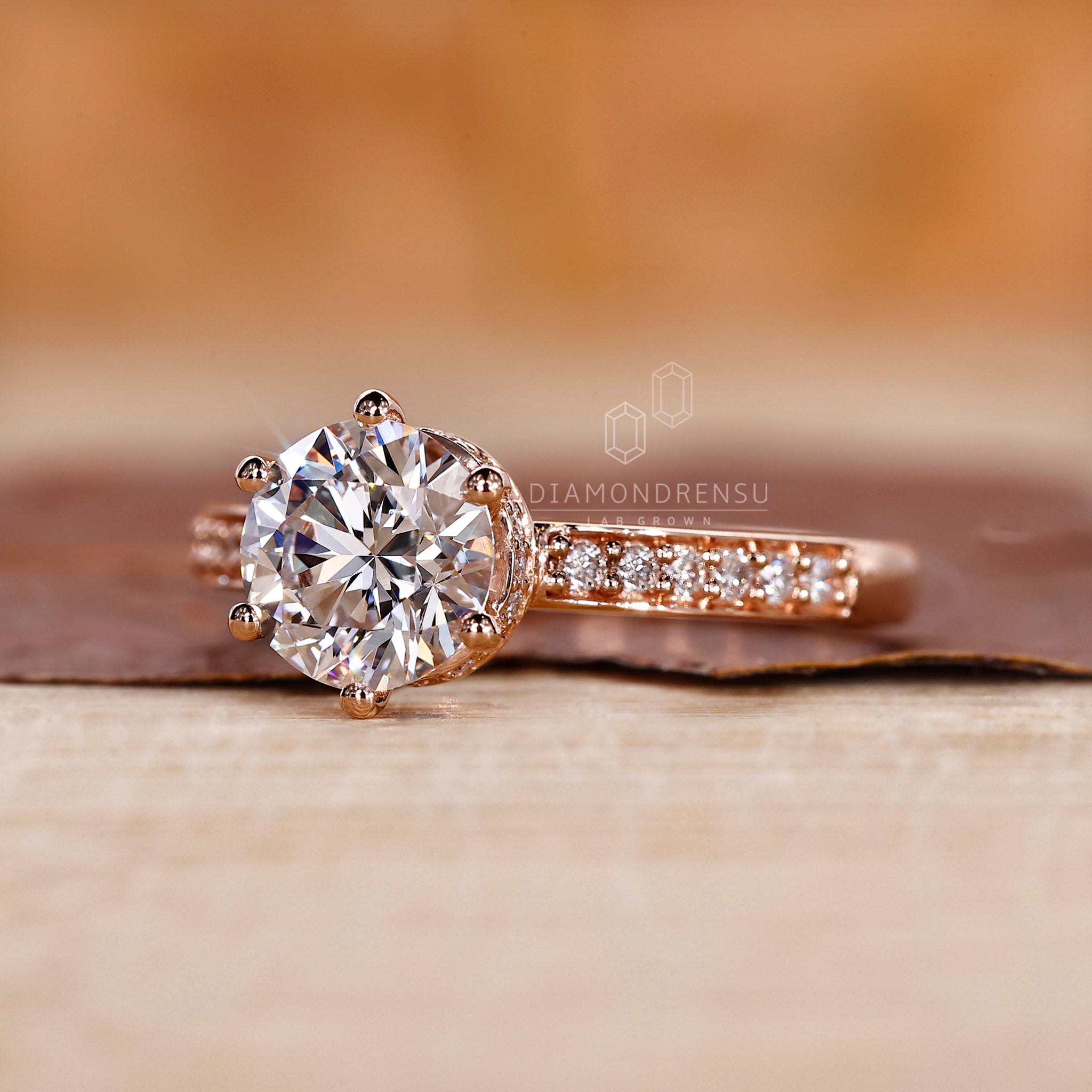 Handmade ring designed with a round cut diamond and hidden halo.
