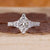 Dutch Marquise diamond ring with trapezoid side stones.
