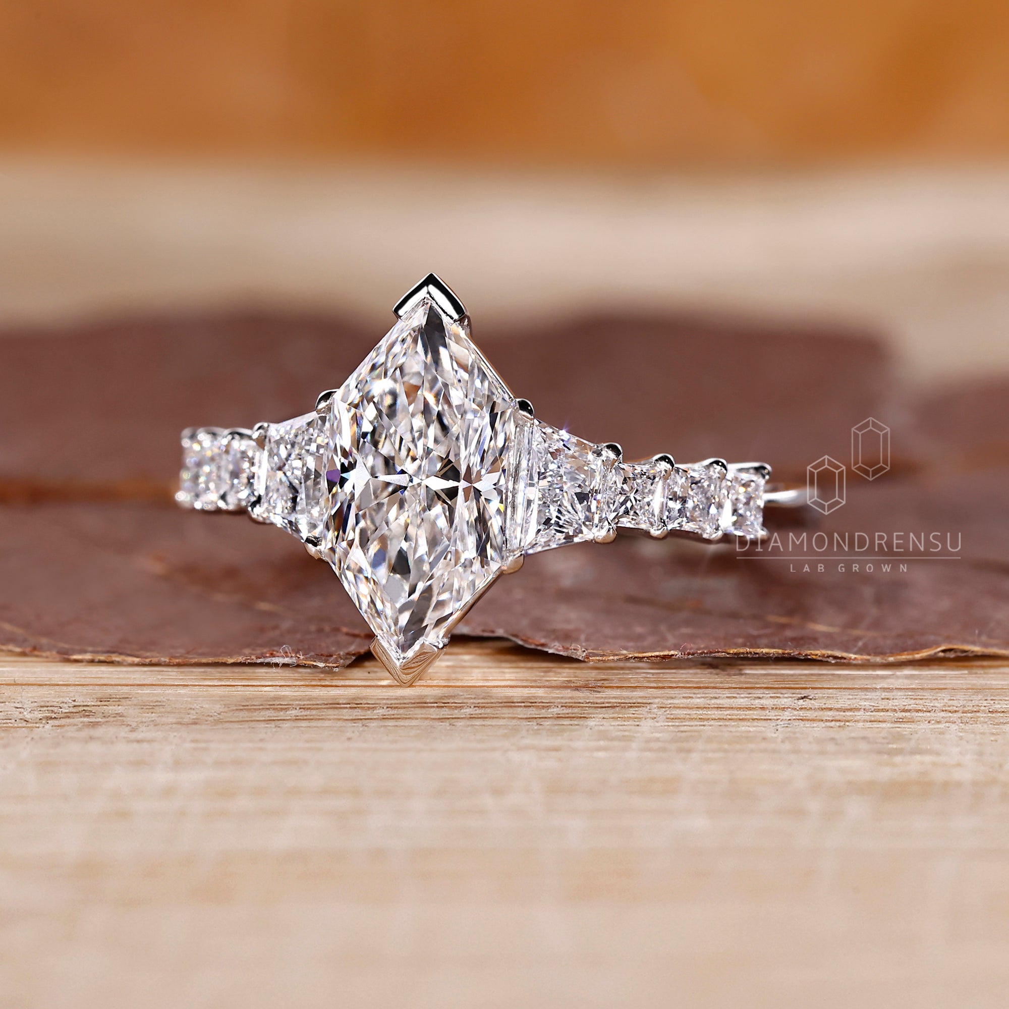 Tapered shank wedding band paired with Dutch Marquise ring.
