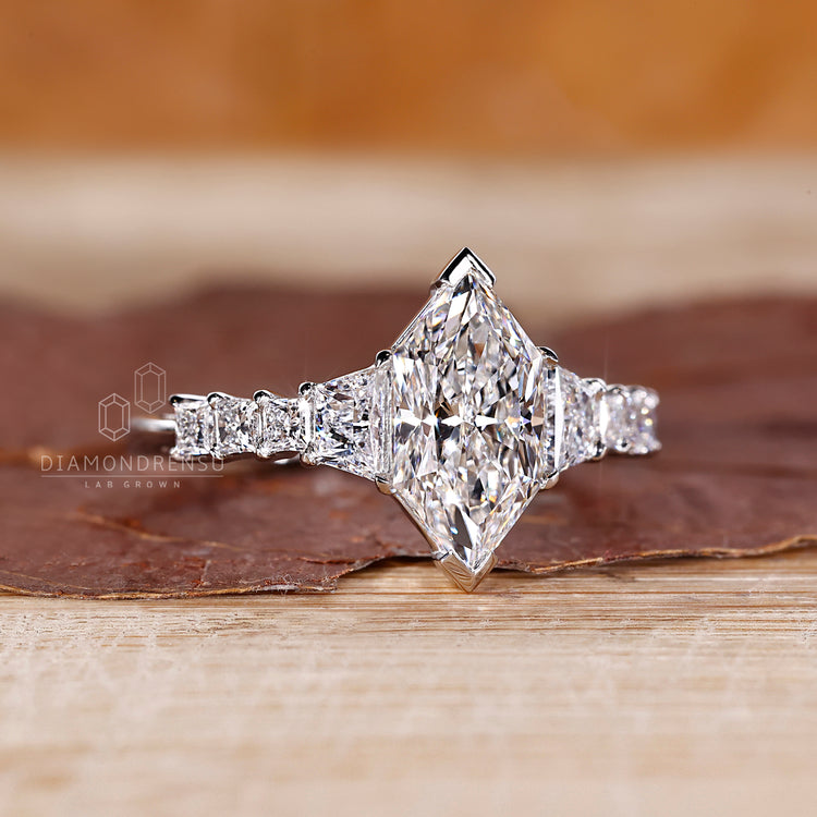 V prong setting holds the Dutch Marquise center securely.
